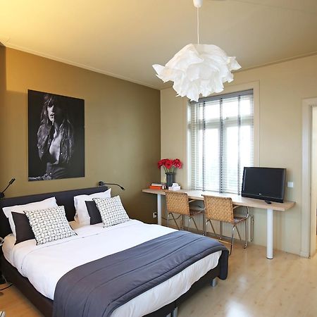 Canal Studio Apartment Amsterdam Bagian luar foto